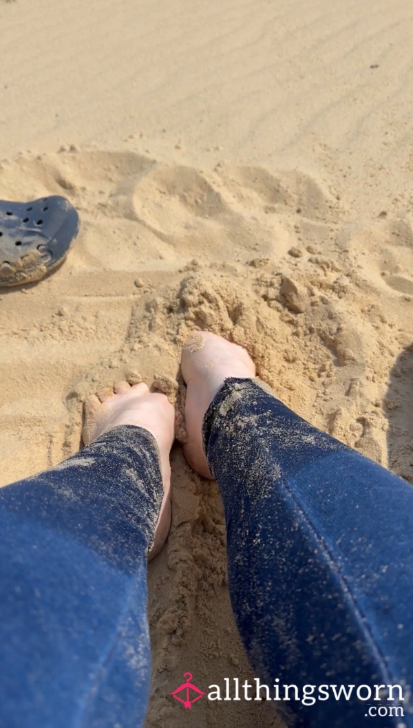 Cute Small Feet Playing On The Beach