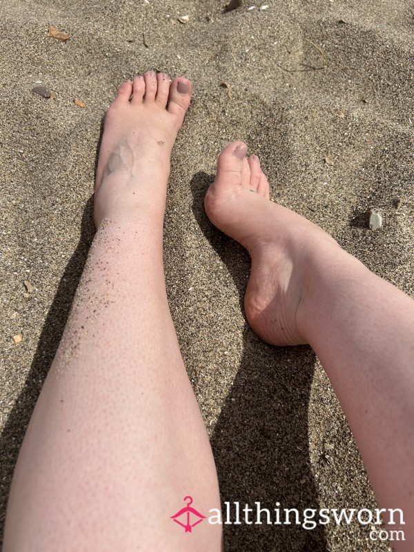 Feet In The Sand And Water