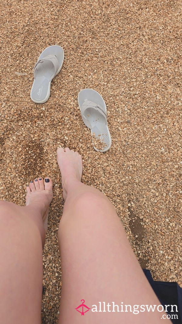 Feet Playing In Rock