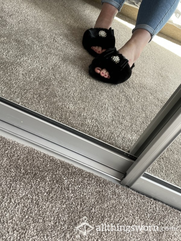 Worn Fluffy Slippers