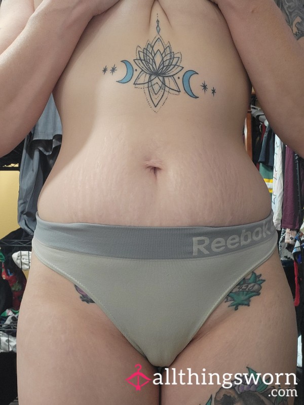 Worn White Reebok Thong